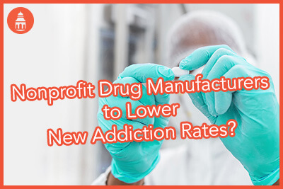 Pharmaceutical worker examining pill. Pharmaceutical manufacturing inspection of a pill or tablet. Drug tablet being inspected.