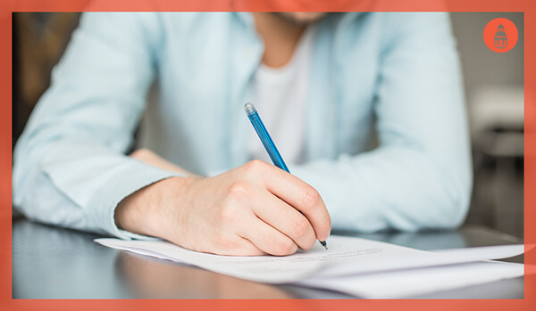 man writing a sample intervention letter