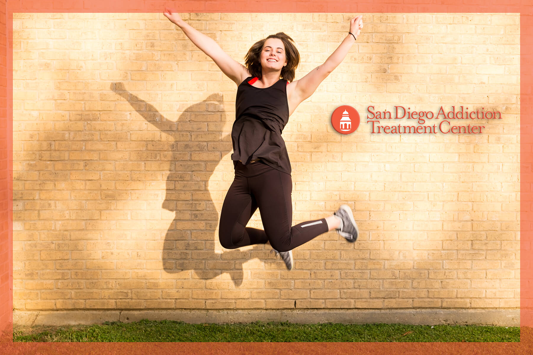 woman jumping up excitedly