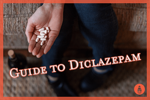 hand holding pills of diclazepam
