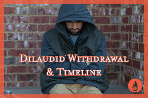 man sitting on bench while going through dilaudid withdrawal