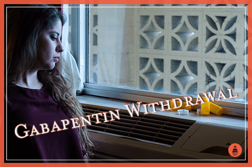 woman going through gabapentin withdrawal staring at a pill bottle