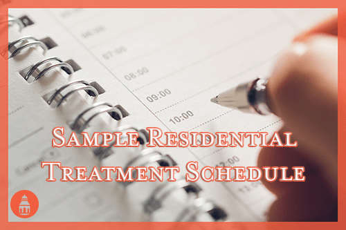 residential treatment schedule example with hand over paper