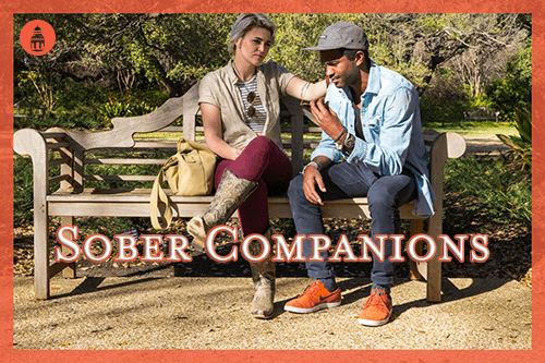 man being consulted by his female sober companion on a bench outside