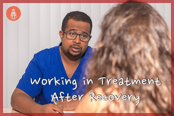 Recovered addict doctor working with patient